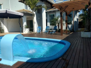Linda casa com piscina e 4 suites no mariscal a 100 metros da praia
